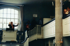 Lynda directs from the high pulpit in the New Room