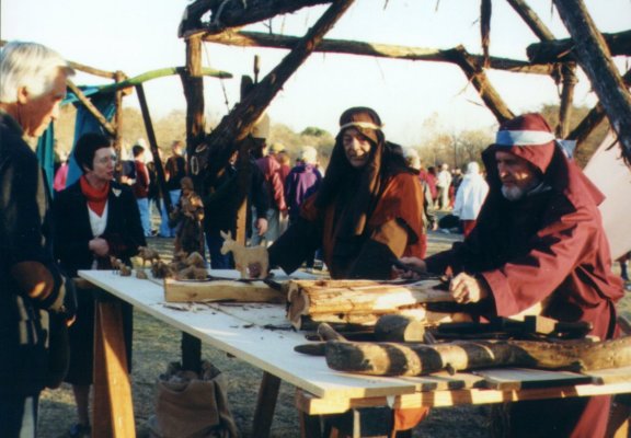 The carpenter wields his tools